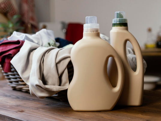 detergent-bottles-clothes-arrangement_23-2148883408